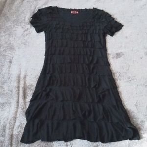 Isle by Melis Kozan black cha cha dress